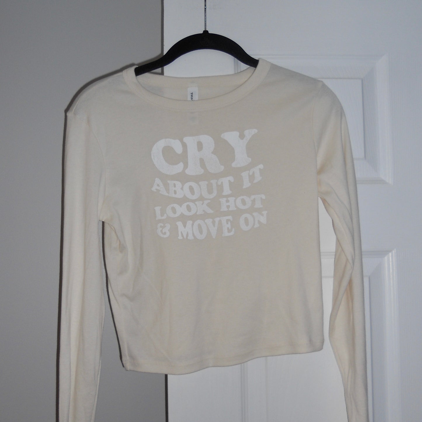 CRY ABOUT IT long-sleeve baby tee