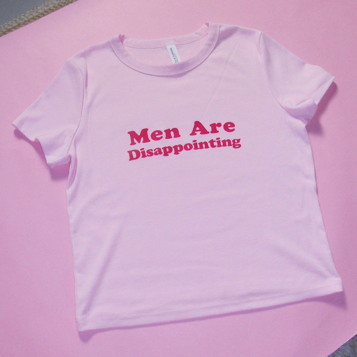 MEN ARE DISAPPOINTING baby tee