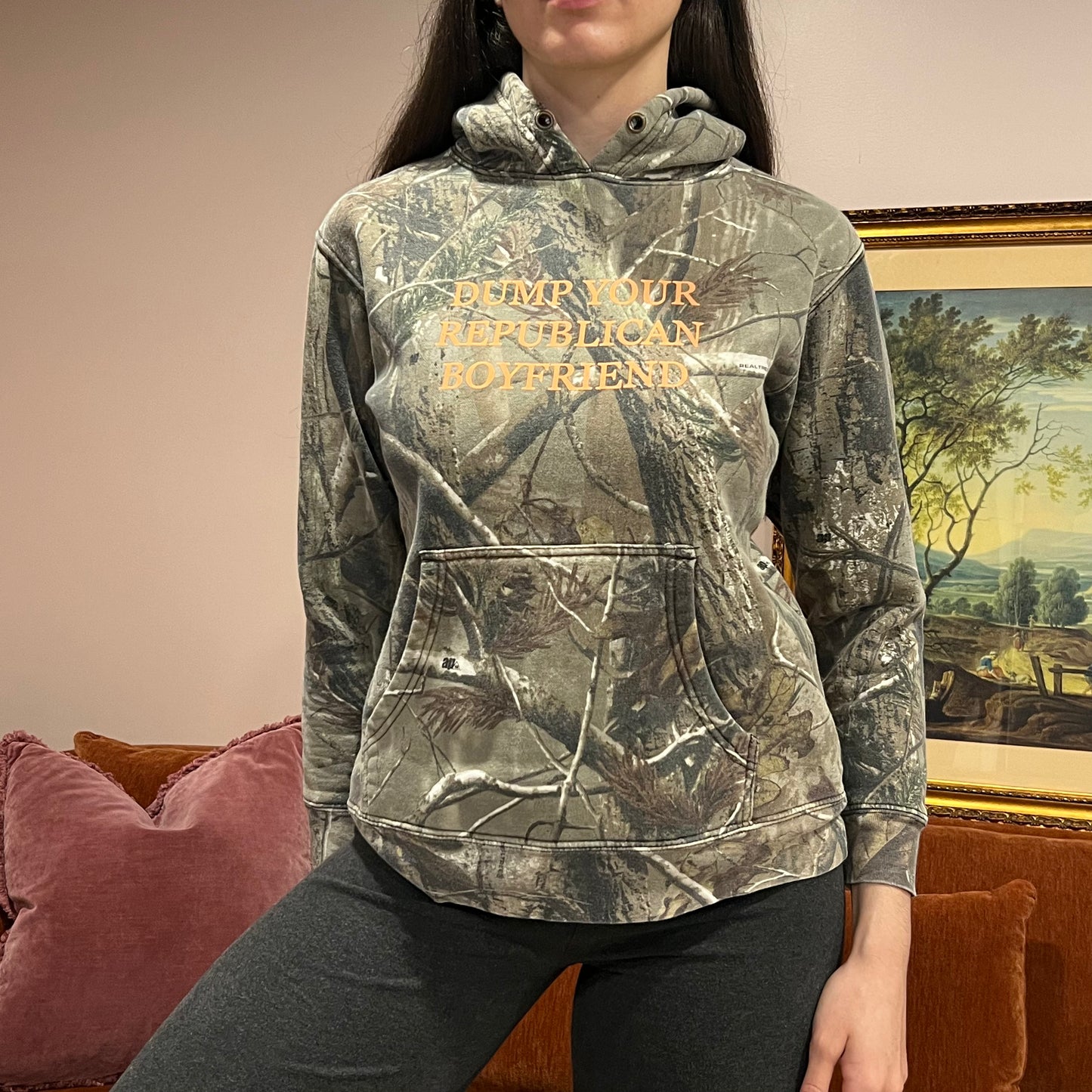 DUMP YOUR REPUBLICAN BOYFRIEND camo hoodie with orange text (S)