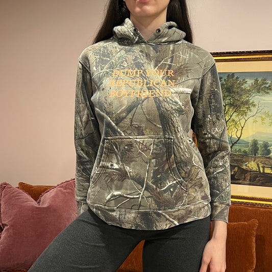 DUMP YOUR REPUBLICAN BOYFRIEND camo hoodie with orange text (S)