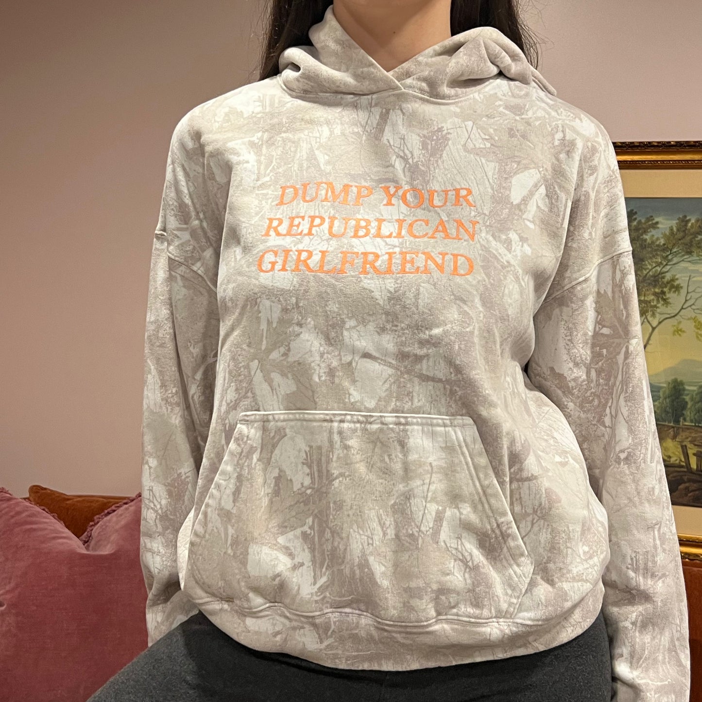 DUMP YOUR REPUBLICAN GIRLFRIEND white camo hoodie with orange text (XS)