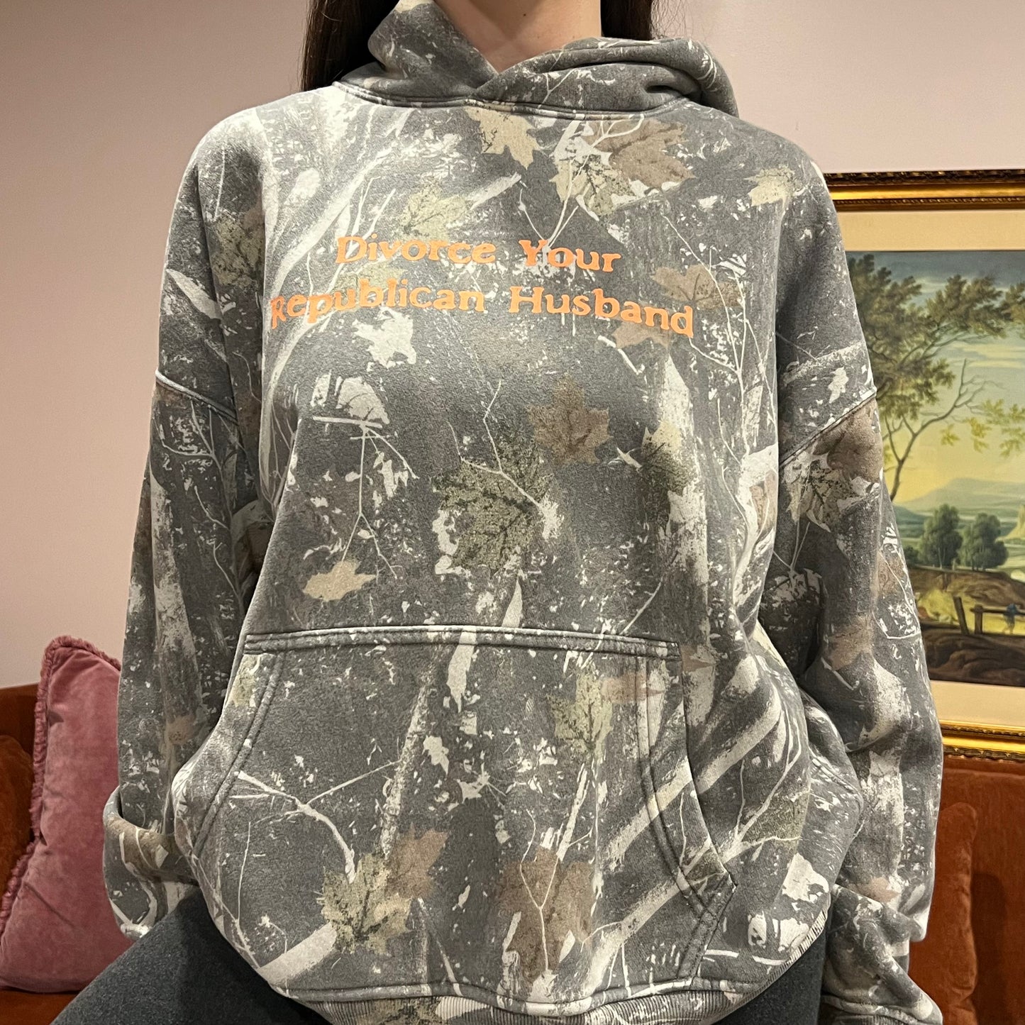 DIVORCE YOUR REPUBLICAN HUSBAND camo hoodie with orange text (L)