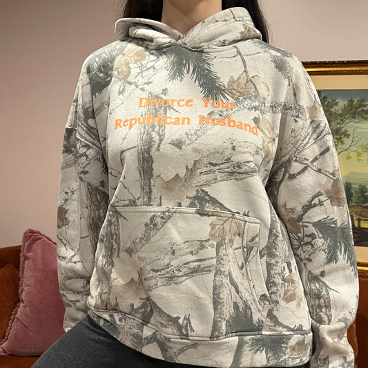 DIVORCE YOUR REPUBLICAN HUSBAND white camo hoodie with orange text (M)